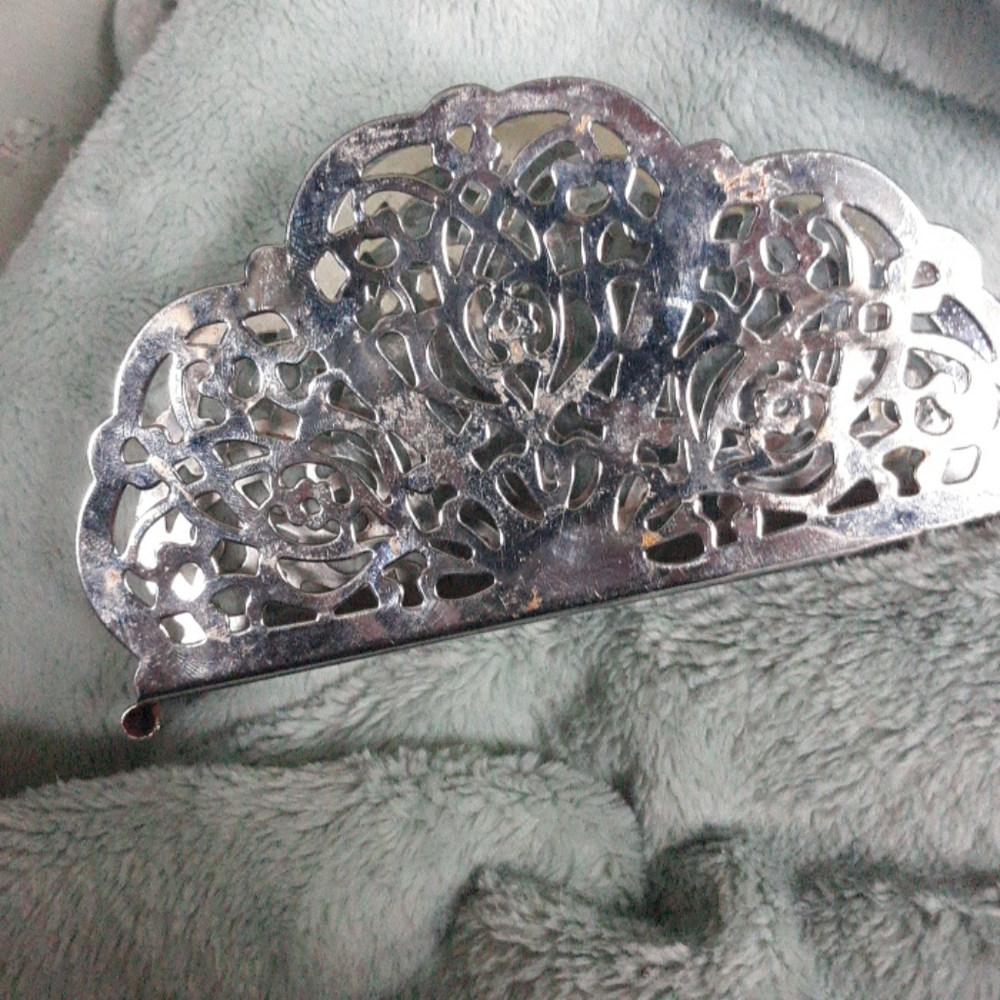 Silver colored napkin holder